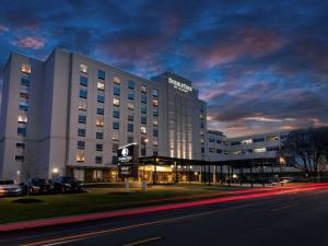 a hotel with a sign on the side of a building at DoubleTree by Hilton Hotel Niagara Falls New York in Niagara Falls