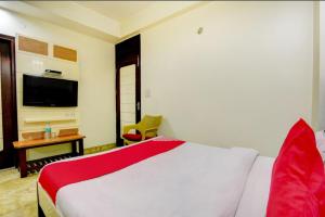 Телевизор и/или развлекательный центр в Hotel Nancy Dx Near New Delhi Railway Station