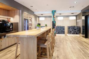 A kitchen or kitchenette at IntercityHotel Wien