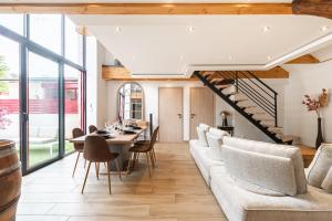 Posezení v ubytování Charmante Maison Climatisée avec son Jardin à 10 minutes de DIJON