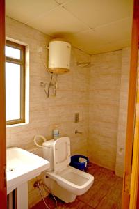 Un baño de Hare Krishna Home Stay