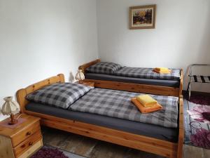 Kottmarschenke - Gästezimmer und Ferienwohnung am Kottmar房間的床