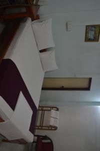 Area tempat duduk di Gnaanams Hotel and Restaurant