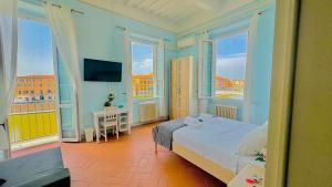 Кровать или кровати в номере B&B - Residenza d'epoca Piazza Cairoli