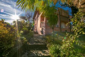 A garden outside Casa Lavanda Pool, Tennis - Happy Rentals