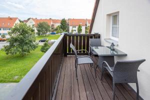 Балкон или терраса в Ferienwohnung Gartenstadt Seilerberg