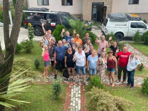 a large group of people posing for a picture at Green Yard Hotel in Batumi