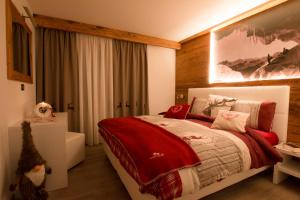 Cama ou camas em um quarto em Residence Villa Artic