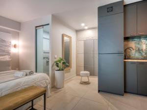 Una cama o camas en una habitación de La Parisienne - Spacieux studio avec parking privé