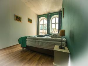 Hostel Pod Basztą में एक कमरे में एक या कई बेड