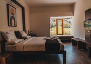 Una cama o camas en una habitación de Mellow Mount Private Homestay