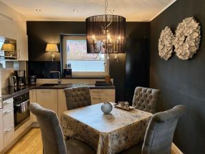 Køkken eller tekøkken på country-suites by verdino LIVING - Apartments & Privatzimmer