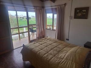 Cama ou camas em um quarto em Linda casa de campo en Mejia - Arequipa