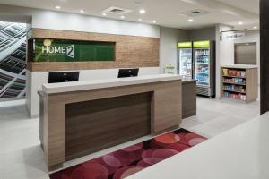 Home2 Suites By Hilton Orlando Airport 주방 또는 간이 주방