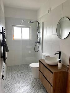 A bathroom at Open and airy home