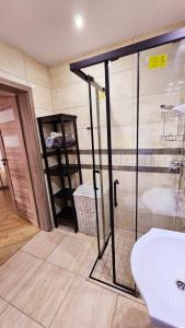 Ванна кімната в Apartament Młynarska