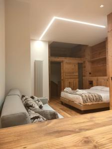 Gulta vai gultas numurā naktsmītnē Fior di Roccia Apartments- in centro Cervinia, sauna privata, Matterhorn dream