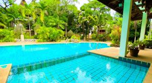 Poolen vid eller i närheten av Tropical garden