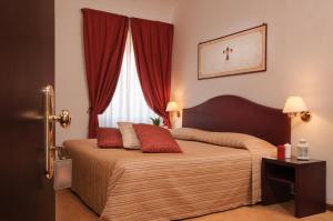 Vuode tai vuoteita majoituspaikassa Hotel Cardinal of Florence - recommended for ages 25 to 55