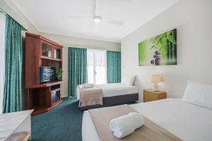 Кровать или кровати в номере City Heart Motel Warrnambool