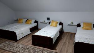 A bed or beds in a room at Amar Apartmani,,