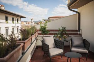 Uma varanda ou terraço em iQ Hotel Firenze