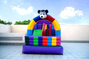 a colorful inflatable play structure with a mickey mouse at DoubleTree By Hilton Jaipur Amer in Jaipur