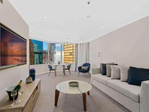 Predel za sedenje v nastanitvi The Sebel Quay West Suites Sydney