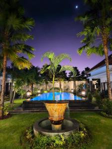 Baseinas apgyvendinimo įstaigoje Kubu Garden Suites & Villas Nusa Dua arba netoliese