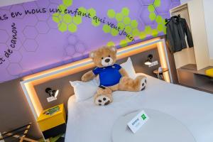 Vuode tai vuoteita majoituspaikassa ibis Styles Strasbourg Stade de la Meinau