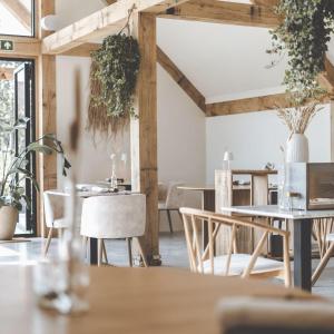 Un restaurant u otro lugar para comer en Op Oost Boutique hotel & Restaurant het Kook Atelier