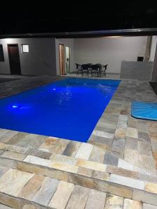 Sundlaugin á Com piscina. Casa para família. eða í nágrenninu