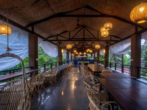 En restaurang eller annat matställe på Madpackers Goa Anjuna - Bunks, Rooms, Community