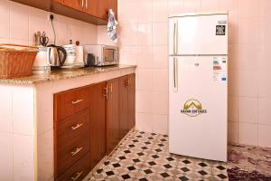 Havan Furnished Apartment-Milimani N9 tesisinde mutfak veya mini mutfak