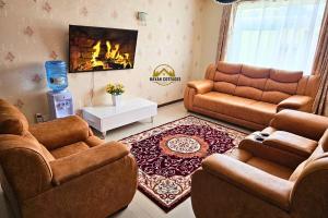 Un lugar para sentarse en Havan Furnished Apartment-Milimani N9