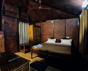 Cama ou camas em um quarto em Mahout Resort Wayanad - An Experiential Jungle Stay with Waterfall