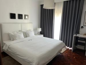 Katil atau katil-katil dalam bilik di HOTEL BOUTIQUE a ESPLANADA