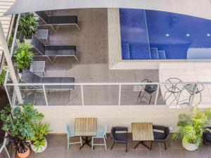 Mercure Centro Port Macquarie tesisinde bir balkon veya teras