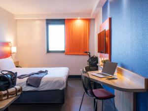 ibis Styles Romans-Valence Gare TGV में एक कमरे में एक या कई बेड