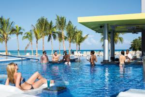 The swimming pool at or close to Riu Palace Jamaica - Adults Only - All Inclusive Elite Club