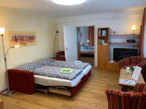 Una cama o camas en una habitación de Ferienwohnung Heimweg