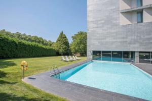 The swimming pool at or close to NH Collection Santiago de Compostela