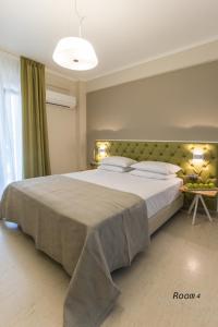 מיטה או מיטות בחדר ב-Hotel Oriana - Adults Only