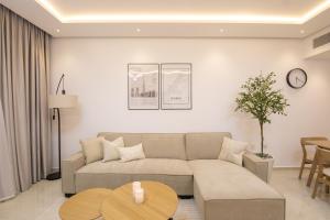 A seating area at Luxury Brand New 1BD Apt in AJMAN FREE Parking NEAR Beach