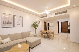 A seating area at Luxury Brand New 1BD Apt in AJMAN FREE Parking NEAR Beach