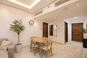 A seating area at Luxury Brand New 1BD Apt in AJMAN FREE Parking NEAR Beach