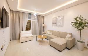 A seating area at Luxury Brand New 1BD Apt in AJMAN FREE Parking NEAR Beach