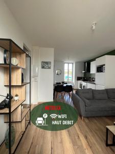 O zonă de relaxare la Le Duplex Tout Confort