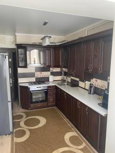 A kitchen or kitchenette at Сучасна квартира в районі Центрального парку