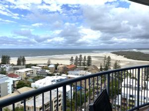 a view of the beach from the balcony of a condo at Centrepoint Apartments Caloundra in Caloundra